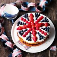 union jack cake with strawberries and blueberries
