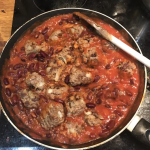 mid-week meals with Dolmio chilli con carne meatballs in frying pan with Dolmio Lunchbox World
