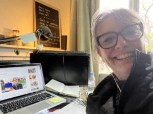 lunch box lady sitting at laptop ready for radio interviews